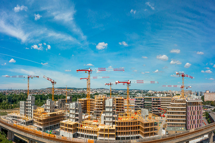 Ten Liebherr tower cranes are helping to build the largest timber campus in Europe